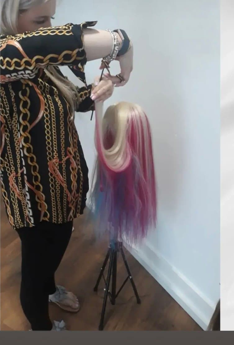 Hair extension training on a mannequin head